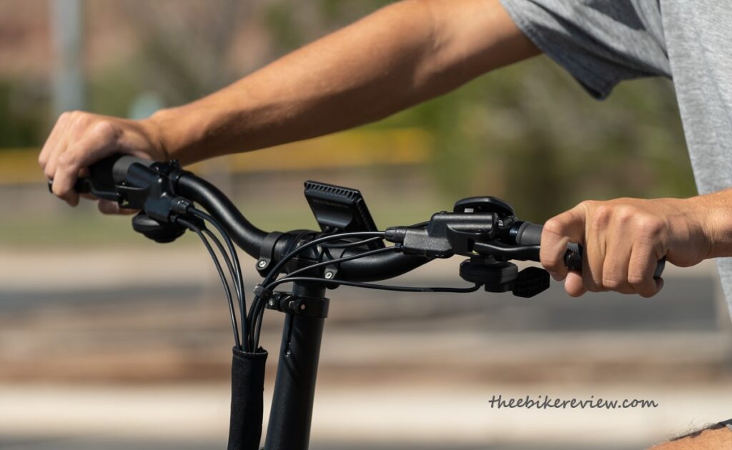 Espin Nesta Electric Bike Review Rider Pulling Brake Levers